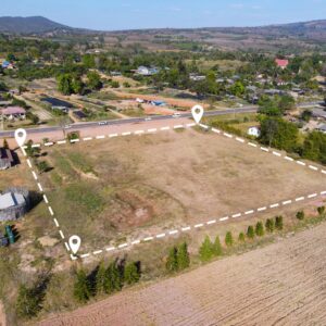 Vacant land with property lines drawn in.